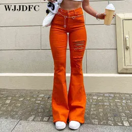 WJJDFC Women's Orange Ripped Flared Jeans Retro High-Waisted Streetwear Stretch Jeans Harajuku Hollow Hip-Lifting Slim Trousers T220728