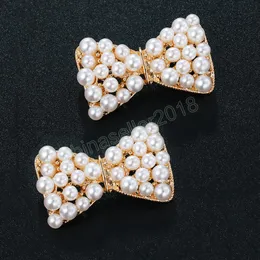 Kvinnor Mode Guldfärg Alloy Rhinestone Pearl Bowknot Broscher Elegant Bröllopsfest Smycken Tillbehör Gåva Brosch Pins