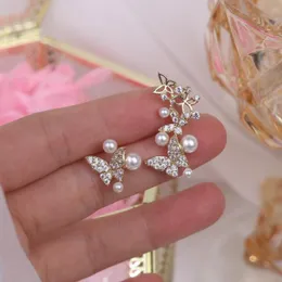 Stud Korea Modeschmuck 14K echte Vergoldung Zirkon Schmetterling asymmetrischer Ohrring elegante Perle Damen AlltagsaccessoiresStud StudStu