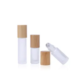 Flacone roll-on in vetro da 5 ml 10 ml 15 ml con coperchio in bambù per oli essenziali Bottiglie trasparenti riutilizzabili ecologiche per campioni di profumo con sfera a rullo in acciaio inossidabile