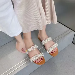 2021 Kvinnor bohemiska pärltofflor platt botten sandaler sommar öppen tå damer skor kristall flip flops skor chaussure femme shrfswuriou