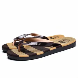 Sommar tofflor 2022 Koreanska mode trenden flip flops med platt sål, hala och enkla strandskor randiga tofflor m8xw #