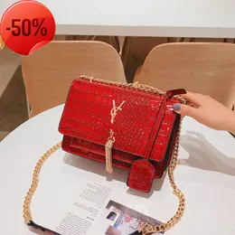 Bolsas de grife de grife Chain FENSSIMENTO MULHERES 2023 NOVA Moda de verão Versátil Estilo estrangeiro Big Brand Red Super Fire Msenger Tote Bag