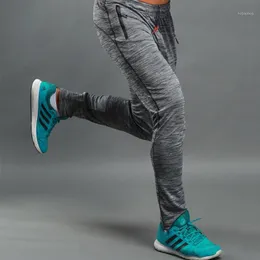 Летние бегущие тренировочные брюки фитнес спортивные мужчины эластичный дышащий пот тренажерный зал баскетбольные брюки
