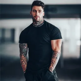 Gyms Tshirt Men krótkie rękawowe bawełniane tshirt swobodne szczupły koszulka męska kulturystyka fitness trening TEE TOE TEE TOPS Summer Clothing 220611