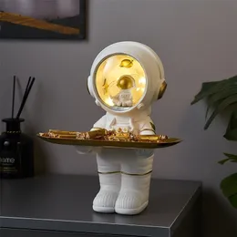 Kreative Astronautenstatue Ablageschale Nordic Home Decor Schreibtischaufbewahrung Astronautenfigur Wohnzimmer Tischdekoration Schlüsselaufbewahrung 220406