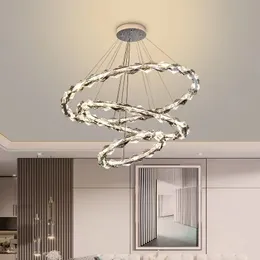 リビングルームペンダントランプ新しいモダンなミニマリストの雰囲気のライトラグジュアリーデザイナーステンレススチールクリスタルリングハンギングランプ天井用
