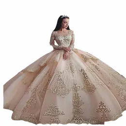 2022セクシーなアフリカンシャンパンQuinceanera Ball Gown Dressesジュエルネックイリュージョンレースアップリケクリスタルビーズ長袖スイープトレインティアードパーティーウエディングガウン