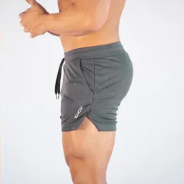 Treinamento de roupas de ginástica shorts de exercícios de fitness Sports Sports Sports Nating Men, com gravata de secagem rápida, mais de tamanho esportivo