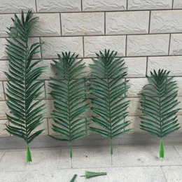 Fiori decorativi Ghirlande Pz / lotto Foglie di albero di cocco artificiale Plastica Pianta verde Foglia di palma finta per paesaggi Decorazione di nozze fai da te Fl