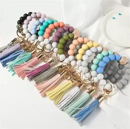 14 Colors Beaded Bracelets Jewelry Wooden Tassel Bead String Bracelet Key chain Food Grade Silicone Beads Women Girl Key Ring Wrist Strap GC1127