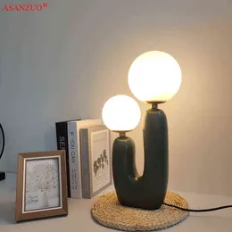 Lampada da tavolo a sfera in vetro smerigliato con doppia resina rosa verde Creatività nordica Camera da letto Studio di illuminazione a LED Lampada da tavolo per soggiorno Decor H220423