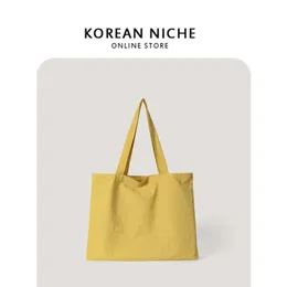 Borsa borsa da donna 2022 primavera ed estate nuovo stile Harajuku design di nicchia monospalla per il tempo libero semplice tela di grande capacità