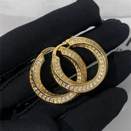 Niche Design Metal Mobius Ring Stud Curved Surface Diamond Earrings Women's Light Luxury High Fashion All-Match Jewelry Accessories