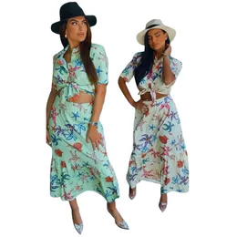 ファッション女性の2ピースドレス女性のスーツとヒトデの貝殻印刷美しいシャツとプリーツスカート2ピーススーツ女性夏の衣装7027