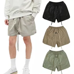 Designershorts för män sommar Mode Lösa baddräkter Dam Streetwear Kläder Avslappnad stil Snabbtorkande Bokstäver Tryckta Byxor Herr S Simkort