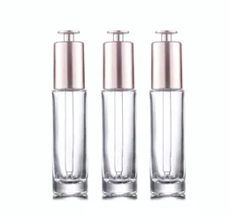 Novo popular 30ml clara garrafas de vidro pressione garrafas de gotas de óleo essencial de maquiagem cosmética