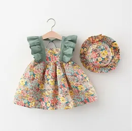 Baby flickor Blommigt tryckt prinsessklänningar med hattar Barn sommar hängselklänning Söt flicka kjolar Barnkläder 2 färger