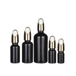 Bottiglia di vetro Imballaggio vuoto Spalla tonda nera lucida Coperchio cesto di fiori Top in gomma bianca Bottiglie contagocce cosmetiche ricaricabili 5ml 10ml 15ml 20ml 30ml 50ml 100ml