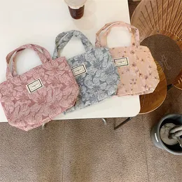 Tredimensionell präglad vävd blomma hand förvaring väska baby barnvagn hängande väska mamma väskor student handväska handväska