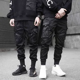 Mężczyźni Spodnie towarowe Czarne wstążki harem joggery zwykłe bawełniane streetwear Hip Hop Pockets Tract