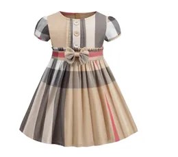 Summer Baby Girls Princess Dresses Kids Plaid kortärmad klänning med bowknot barn knapp kjolar barn Skrit 2-7 år