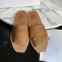 2022 Kapcie damskie Woody Muller Buty Designer Canvas Cross Topen Sandals Lato Outdoor Outdour Toe Casual Pantofper List Stylist Shoe S5566