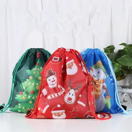 Noel Drawstring Bag Xmas Noel Baba Kardan Adam Elk Ağaç Baskılı Askı Çanta Çocuk Polisster Sırt Çantaları Karikatür Okul Çapası Erkek Kızlar Paket Cep 12 Color1