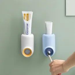 4 colori Creativo automatico dentifricio spremiagrumi Accessori per il bagno Dentifricio a parete senza dentifricio perforato Porta dentifricio