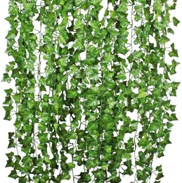 12個/パック人工アイビーの葉の植物のつるのぶら下がっている花輪の偽の葉の花の家の家のキッチンガーデンオフィスの結婚式の壁の装飾