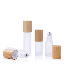 5 10 15ml Frosted clear Roll On Glass Bottle with Bamboo Cap 1/2 oz Roller Ball Perfume Essential Oil Bottles custom logo SN6490