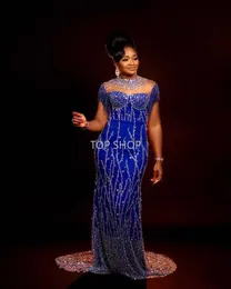 Nuovo Plus Size Arabo Aso Ebi Lussuoso Sheer Neck Prom Dresses Paillettes con perline Guaina da sera formale Party Second Reception Gowns Dress