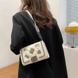 Bags 2022 popular single shoulder sewing Pu personalized badge versatile small fragrance cross messenger chain women's bag