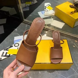 First Black leather high-heeled sandals with wide band and strap Made of leather Diagonal F-shaped sculpted heel in gold-coloured metal Multicolor Box