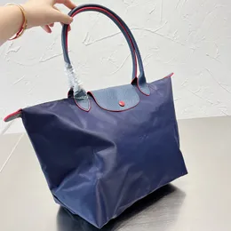 Tote Çantalar Tote Çanta Kadın Naylon Tasarımcılar Moda All Maç Klasik Kadın Sokağı Trend El Büyük Boy 230325