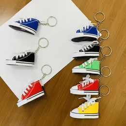 Diseñador Mini zapatos de lona llaveros moda bicicleta motocicleta pie soporte zapato llavero adulto niño bolso encantos joyería regalo