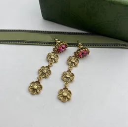 Orecchini di design di lusso con ciondolo a forma di fiore di moda ciondolano l'orecchino a goccia bijoux per le donne lady Regalo di gioielli di fidanzamento per gli amanti del matrimonio con scatola