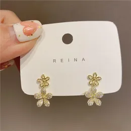 Dingle ljuskrona korea design mode smycken 14k guld pläterad utsökt zirkon ihålig blomma örhänge elegant kvinnors bröllopstillbehör