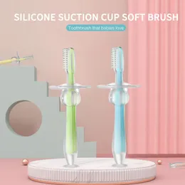 Spazzolino da denti da latte tridimensionale in silicone per addestramento del bambino con ventosa in piedi Spazzolino da denti in silicone con spazzolino deflettore