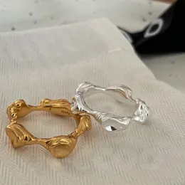 Otro diseñador Luna Forma de superficie Anillo 925 Material de plata esterlina Hombres y mujeres Tendencia Calle Todo fósforo Accesorios de joyería de moda 95nn