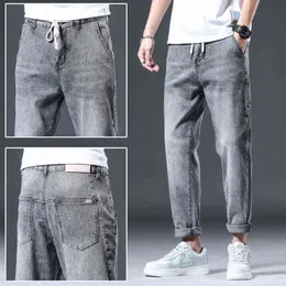 Версия корейский 2022 весна и летний светло -серый молодежный молодежь микроа -джинсы мужские эластичные лист