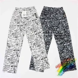 Zagranizacja spodni we11done mężczyźni kobiety Wysokiej jakości czarne białe graffiti pełne spodnie Welldone spodnie T220721