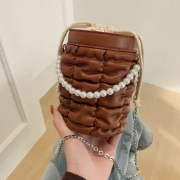 Trend mini pérola feminina bolsa de moda de luxo com cadeia de metal designer de bolsa de ombro ruched saco de balde feminino crossbody