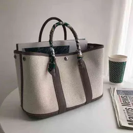 Nuova tela di grande capacità con borsa per la testa in pelle bovina festa in giardino mano casual monospalla miaoqibags tote inclinata di colore