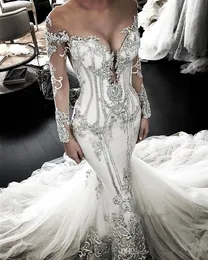 Ups Sheer Mesh Top Lace Mermaid Bröllopsklänningar 2022 Tulle Lace Applique Beaded Crystals Långärmade Bröllop Bröllopklänningar