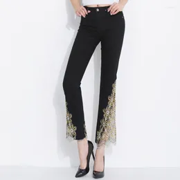 Jeans da donna FERZIGE Marca 2022 Bellissimi pantaloni a zampa con ricamo Donna Streetwear Skinny Vita alta Lady Plus Size Pantaloni blu neri