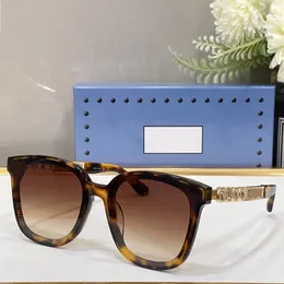 Beliebte Herren-Damen-Sonnenbrille einer bekannten Marke G0071. Tempeldesign unterstreicht den Sinn für Mode der Marke. Outdoor-Strand-UV-Schutzband, Originalverpackung