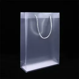 JIANTA 24 Sacchetti Regalo Trasparenti In PVC Con Manici – 23x16x7 Cm, Riutilizzabili E Impermeabili