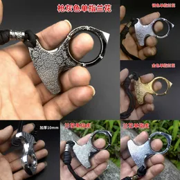 Själv EDC Personlig försvar Key Chain Pendant Thicked Orchid One Finger Tiger Martial Arts Lotus Single Fist Button Broken Window CG7C