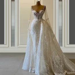 Elegantes Meerjungfrau-Hochzeitskleid, lange Spitzenärmel, tiefer V-Ausschnitt, stilvolle Applikationen, Spitze, bodenlang, abnehmbare Schleppe, Illusion, maßgeschneiderte Rüschen, bodenlanger Brautstil